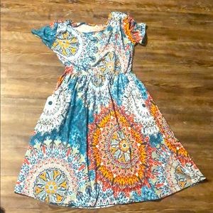 Boutique dress very soft and has pockets